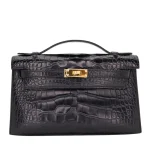 11 Hermès Replica - Kelly Pochette Black Matte Alligator Gold HW Front 1:1 Hermès Replica - Kelly Pochette Black Matte Alligator