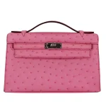 Best Replica Hermes - Kelly Pochette Bubblegum Ostrich Palladium HW Front Best Replica Hermes - Kelly Pochette Bubblegum Ostrich