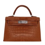 Mirror Quality Hermès Replicas - Kelly II Sellier Mini Gold Matte Alligator Palladium HW Front Mirror Quality Hermès Replicas - Kelly II Sellier Mini | ReplicaHermesBags.co