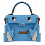 Premium Hermès Replica - Kelly Doll Picto Celeste Epsom Palladium HW Front Premium Hermès Replica - Kelly Doll Picto Celeste Epsom